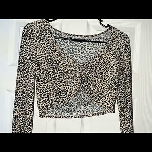 this is a leopard print top from shein! it has been worn once and is very light!